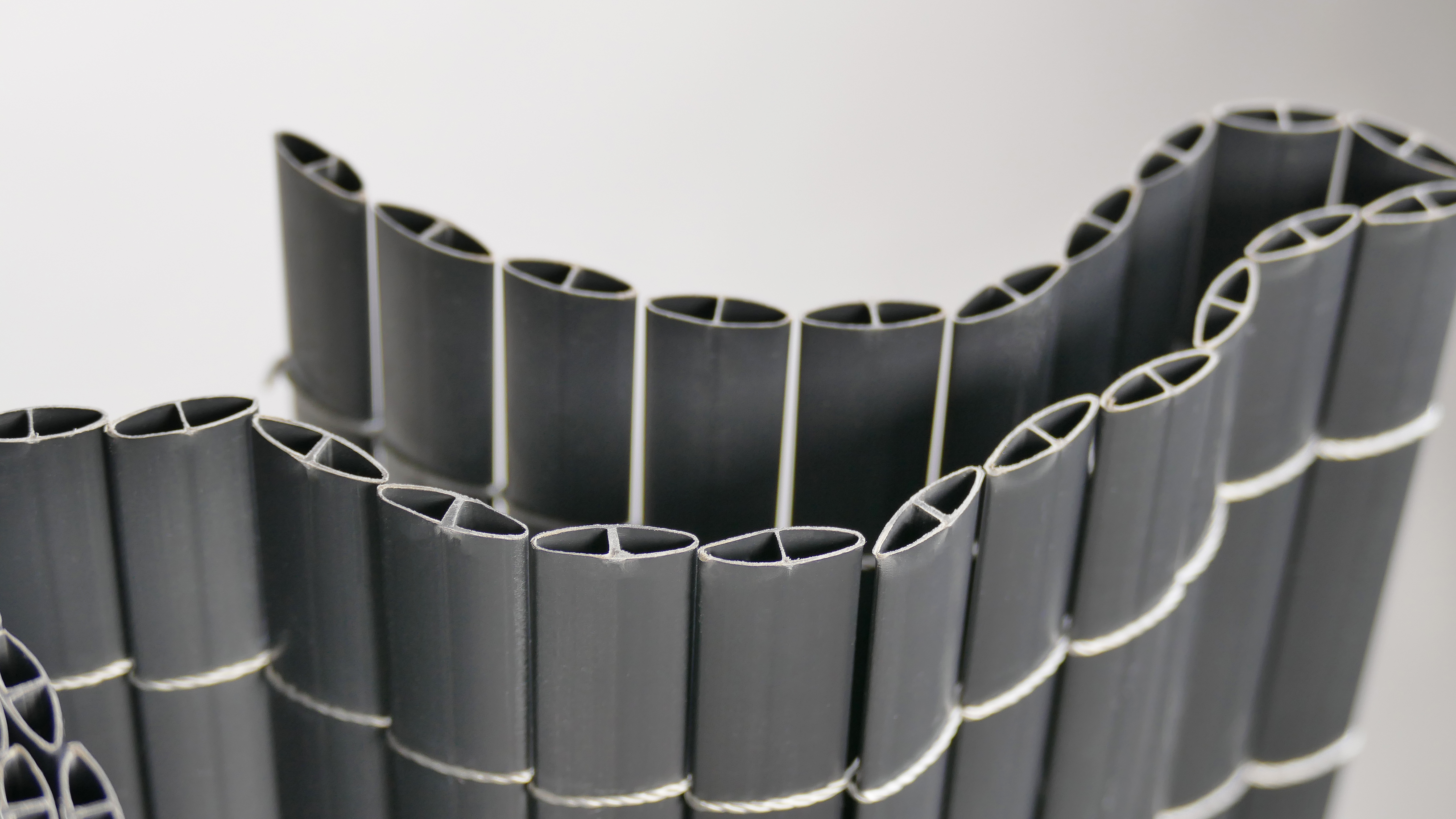 Ultra-Reinforced PVC Screening with Double-Sided Fasteners installed on garden fence